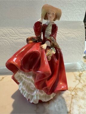 Royal Doulton Red and Cream Glazed Lady Figurine
